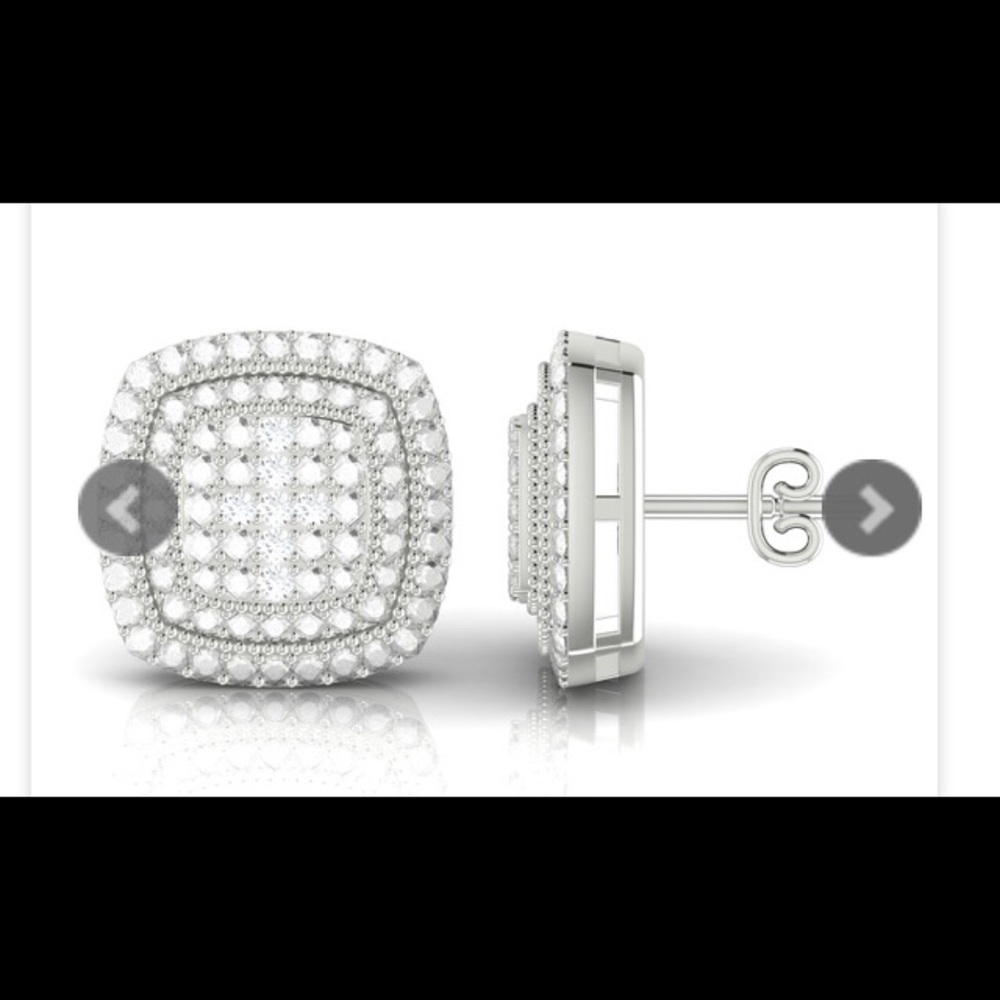 New Ladies Diamond Earrings. .05CTW